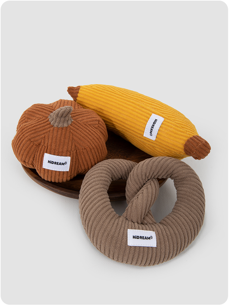 Three catnip plush toys on a plate
