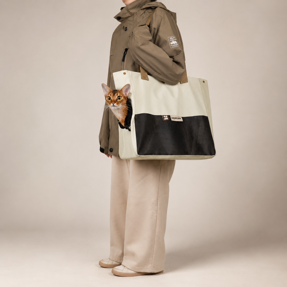 Almond Toast color variant of the Color-Block Cat Sling Carrier Bag